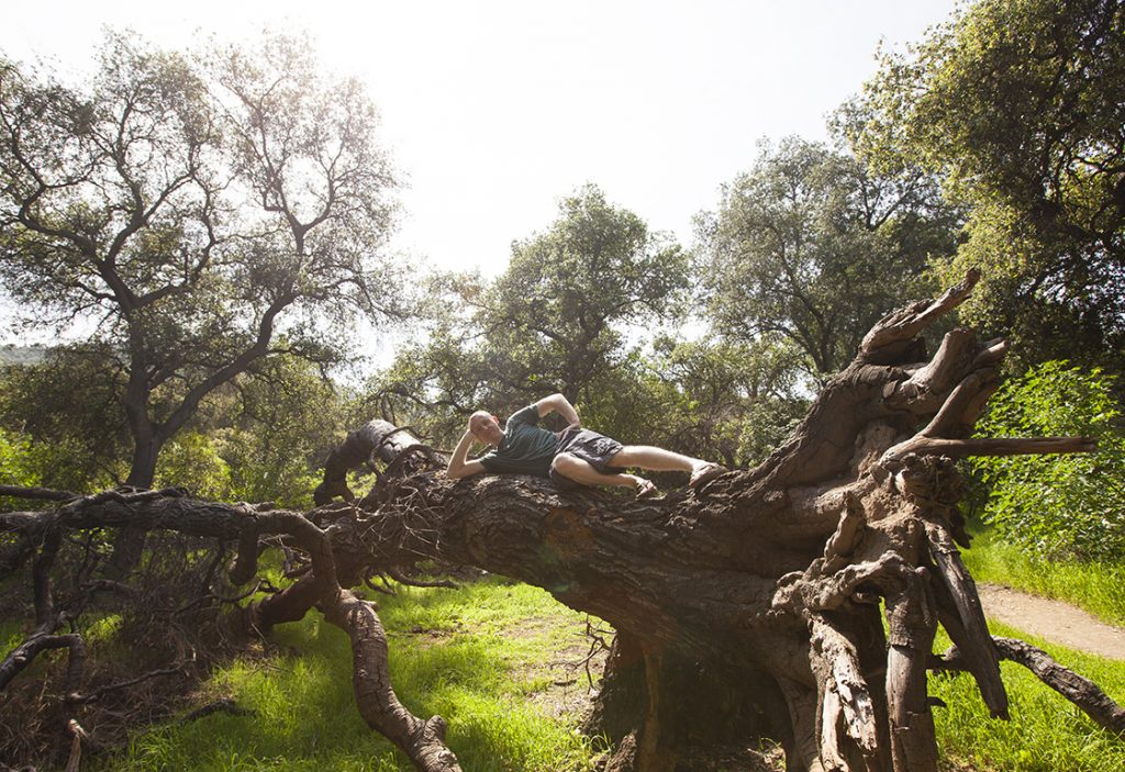 Ilya posing on a fallen Oak Tree - Descanso Garden
