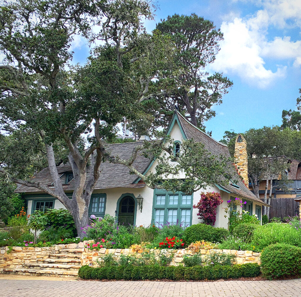 Cottage in Carmel by the Sea designed and built by Hugh Comstock.  Beautiful garden and landscaping.