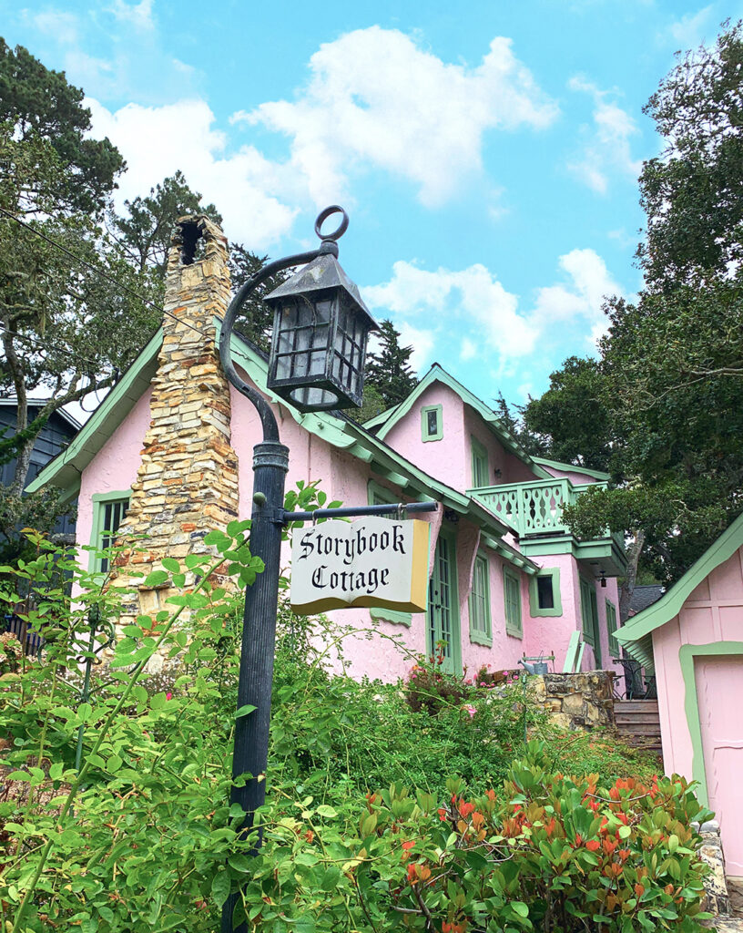 Cute pink storybook cottage house designed by Hugh Comstock in the city of Carmel by the Sea, California.